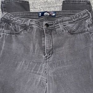 Distressed black jeggings